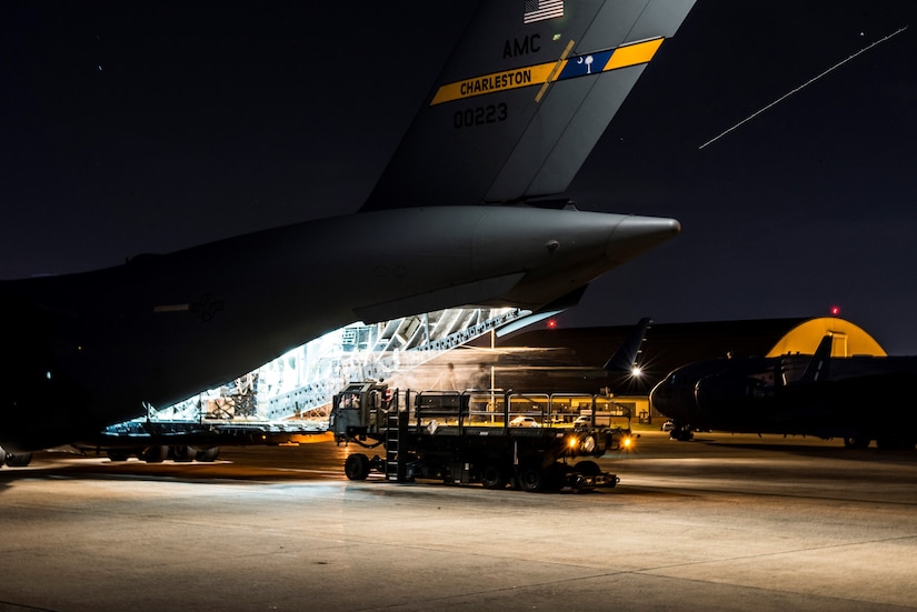 89th Aerial Port Squadron Airmen load cargo on a C-17 Globemaster III in the middle of the night for a transient mission at Joint Base Andrews, Maryland. Members of the 89th APS, often called ‘the Port Dawgs,’ were recently recognized with winning the Air Force Large Terminal of the Year award for providing around-the-clock air transportation support for the president, national leaders, combatant commanders and Special Air Mission operations. 