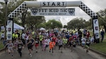JBSA - Runners take off from the starting line during the Fit Kid 5K and Health Fair March 12 at Heritage Park on Joint Base San Antonio-Randolph. The Fit Kid 5K and Health Fair is part of National Nutrition Month that aims to teach children healthy habits related to nutrition and fitness. 
