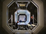 From left: Jason Joiner, Kent Bartlett, Emilia Kawashima and Jonathan Forest prepare the Anechoic Flow Facility for a test Nov. 20, 2016, at Naval Surface Warfare Center, Carderock Division in West Bethesda, Md. (Photo by Steven Garafalo/Released)