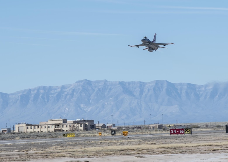 A QF-16 drone flies over Holloman Air Force Base, N.M., on Feb. 10, 2017. Lt. Col. Ronald King, the 82nd Aerial Targets Squadron, Det. 1 commander, piloted the drone during the first flight at Holloman since the transition from QF-4 Phantoms to QF-16s. The QF-16 serves as a full-scale aerial target to test next-generation weapons systems. (U.S. Air Force photo by Senior Airman Emily Kenney)