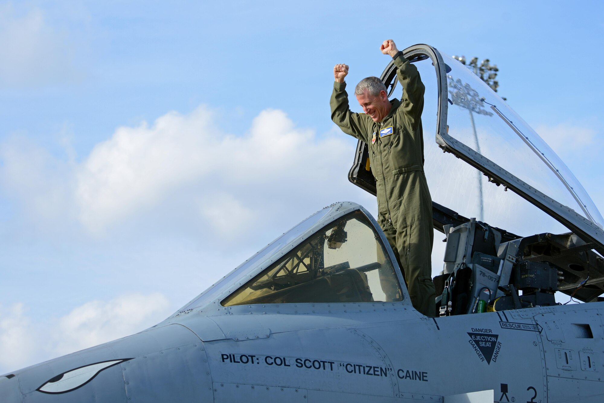 U.S. Air Force Col. Scott Caine, 9th Air Force vice commander, celebrates in an A-10C Thunderbolt II following the final flight of his Air Force career, Shaw Air Force Base, S.C., Feb. 8, 2017. Caine became the 9th AF vice commander in April 2012 after an assignment as the 9th AF director of operations. (U.S. Air Force photo by Airman 1st Class Kathryn R.C. Reaves)