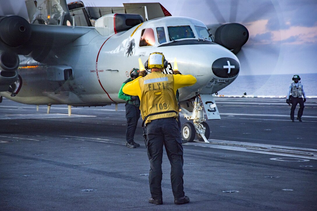 Sailors prepare to launch an aircraft during flight operations on the aircraft carrier USS Carl Vinson in the Pacific Ocean, Feb. 7, 2017. Navy photo by Seaman Jake Cannady 