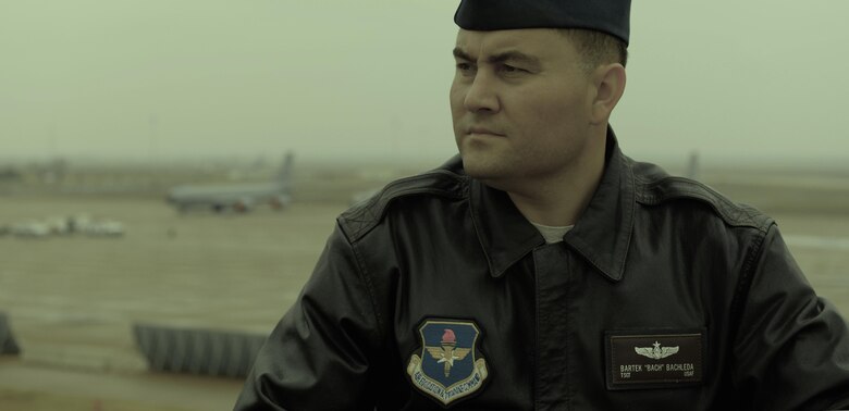 Then Tech. Sgt. Bartek Bachleda, 97th Operations Support Squadron NCO in charge of current operations, poses for a photo near the flightline at Altus Air Force Base, Okla.(U.S. Air Force photo/Senior Airman Robert Gunn)