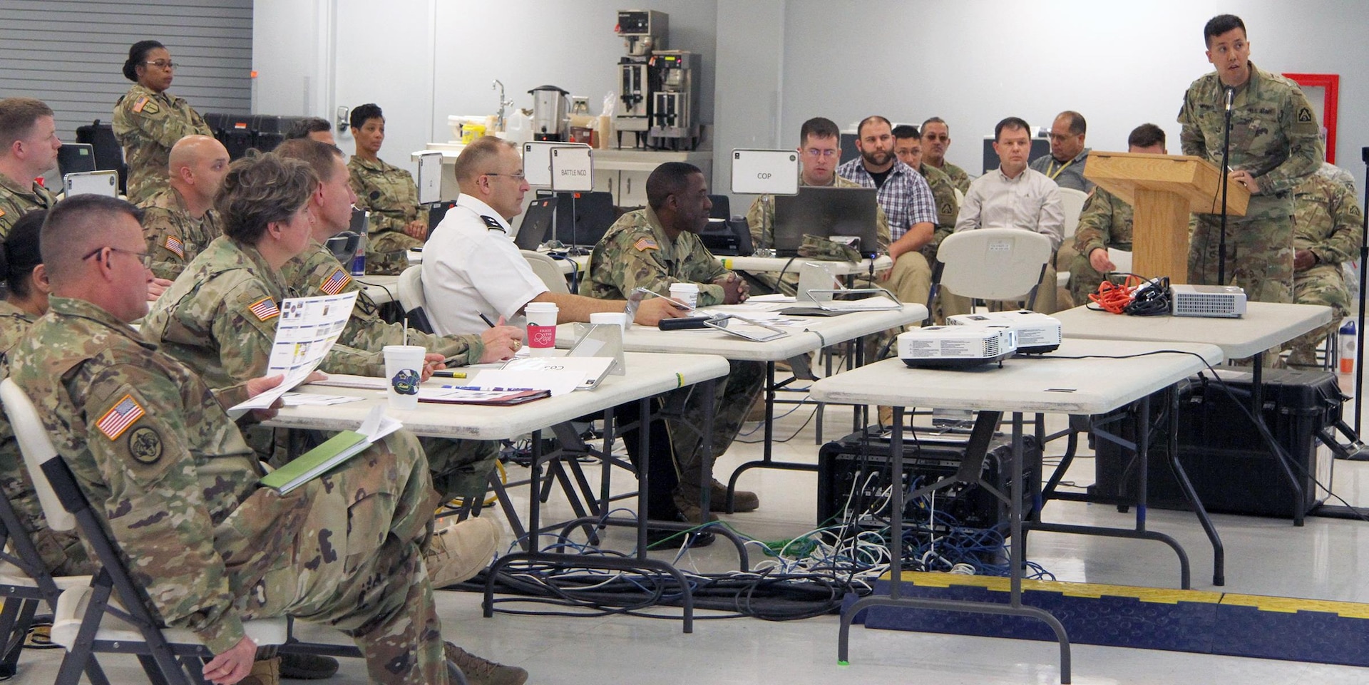 Staff members assigned to Task Force 51, U.S. Army North (Fifth Army) from Joint Base San Antonio-Fort Sam Houston conduct a commander’s update brief for Maj. Gen. Brian Harris, Task Force-51 commander, during a staff training exercise at the Rudder Reserve Center Feb. 6-10. 
