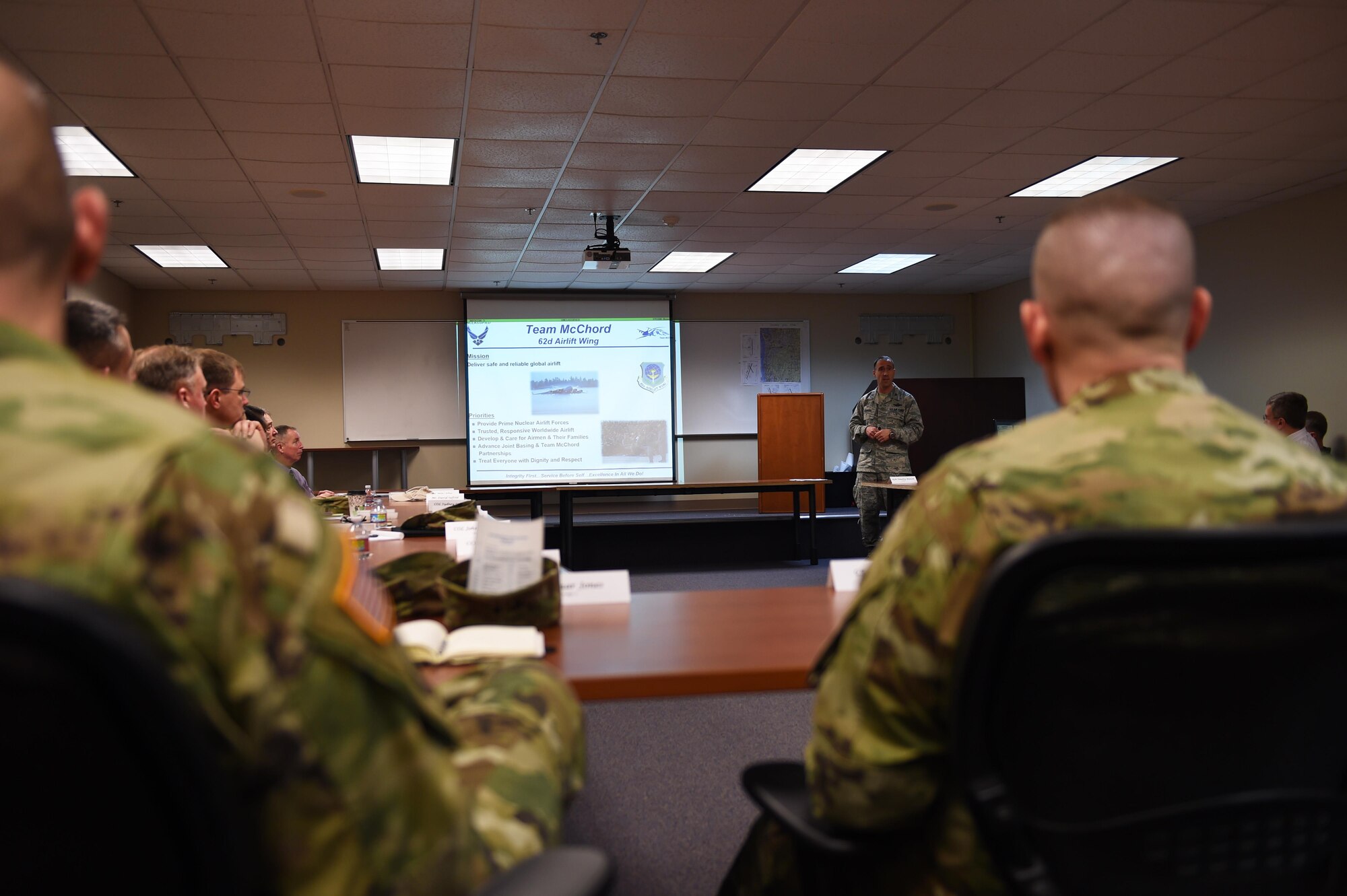 Col. Leonard Kosinski, 62nd Airlift Wing commander, speaks to Army leadership during a McChord orientation Feb. 9, 2017, at Joint Base Lewis-McChord, Wash. The goal of the orientation was to educate Army partners at JBLM about the mission and capabilities of the 62 AW. (Air Force photo/ Staff Sgt. Naomi Shipley)