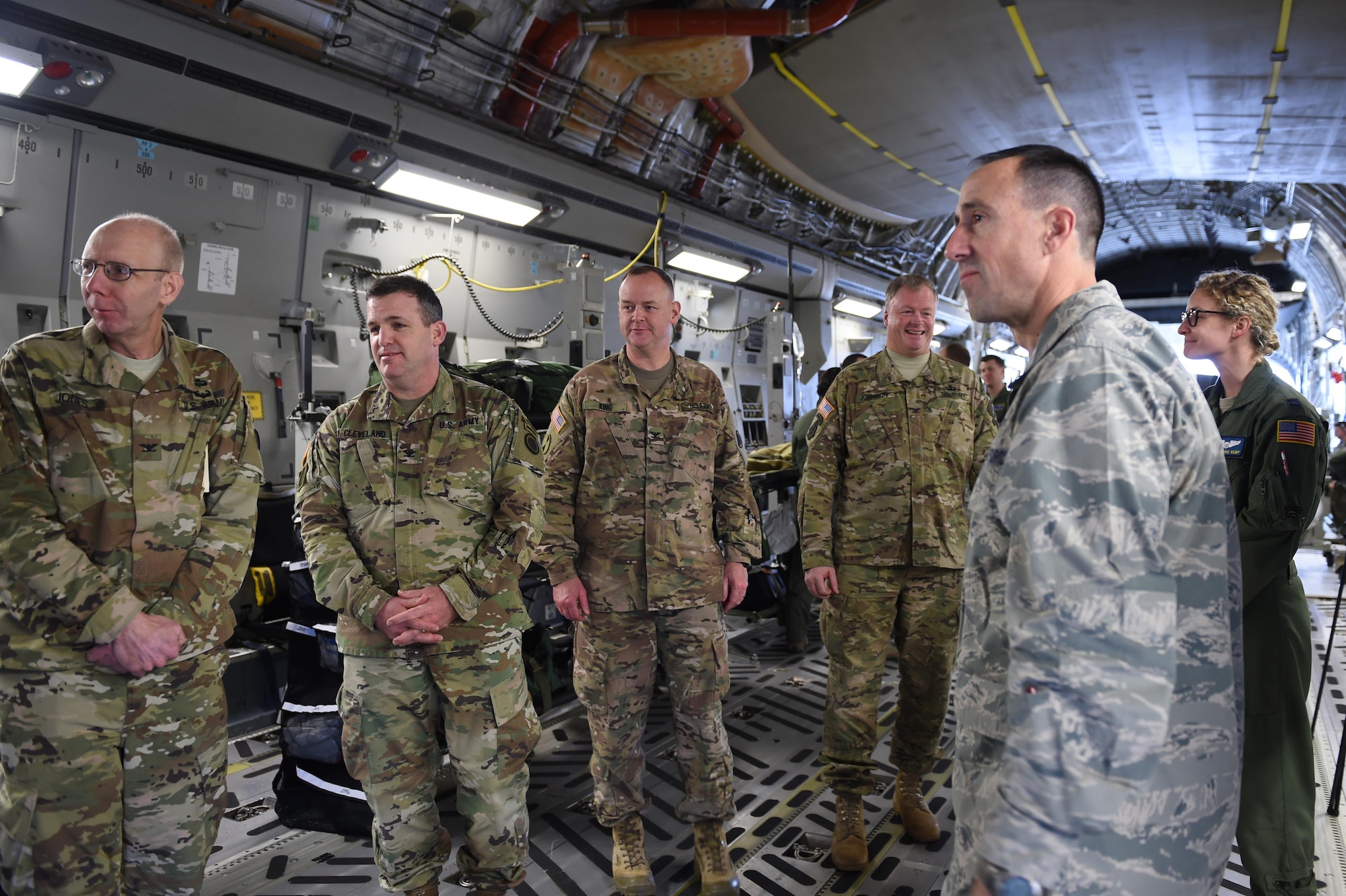 Col. Leonard Kosinksi (right), 62nd Airlift Wing commander, and Joint Base Lewis-McChord leadership visits a static C-17 Globemaster III on the McChord Field flightline Feb. 9, 2017 on JBLM, Wash. The 62AW hosted our joint base partners in an effort to provide a familiarization piece as to what units and mission sets the Air Force does. (Air Force photo/ Staff Sgt. Naomi Shipley)