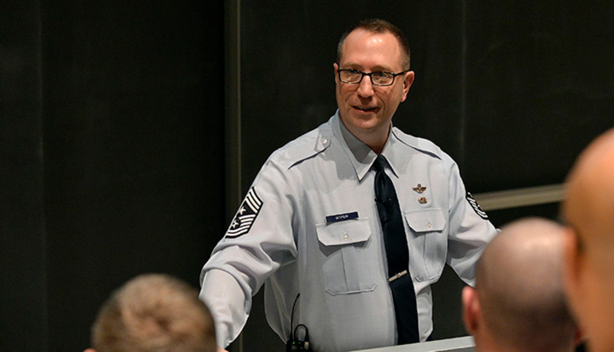 Chief Master Sgt. Robert Boyer, the command chief at the U.S. Air Force Academy, speaks to enlisted Airmen Jan. 31, 2017 at an all-call in Arnold Hall Theater. Boyer also hosted an all-call for enlisted Airmen at the Community Center Theater the same day. (U.S. Air Force photo/Jason Gutierrez)
