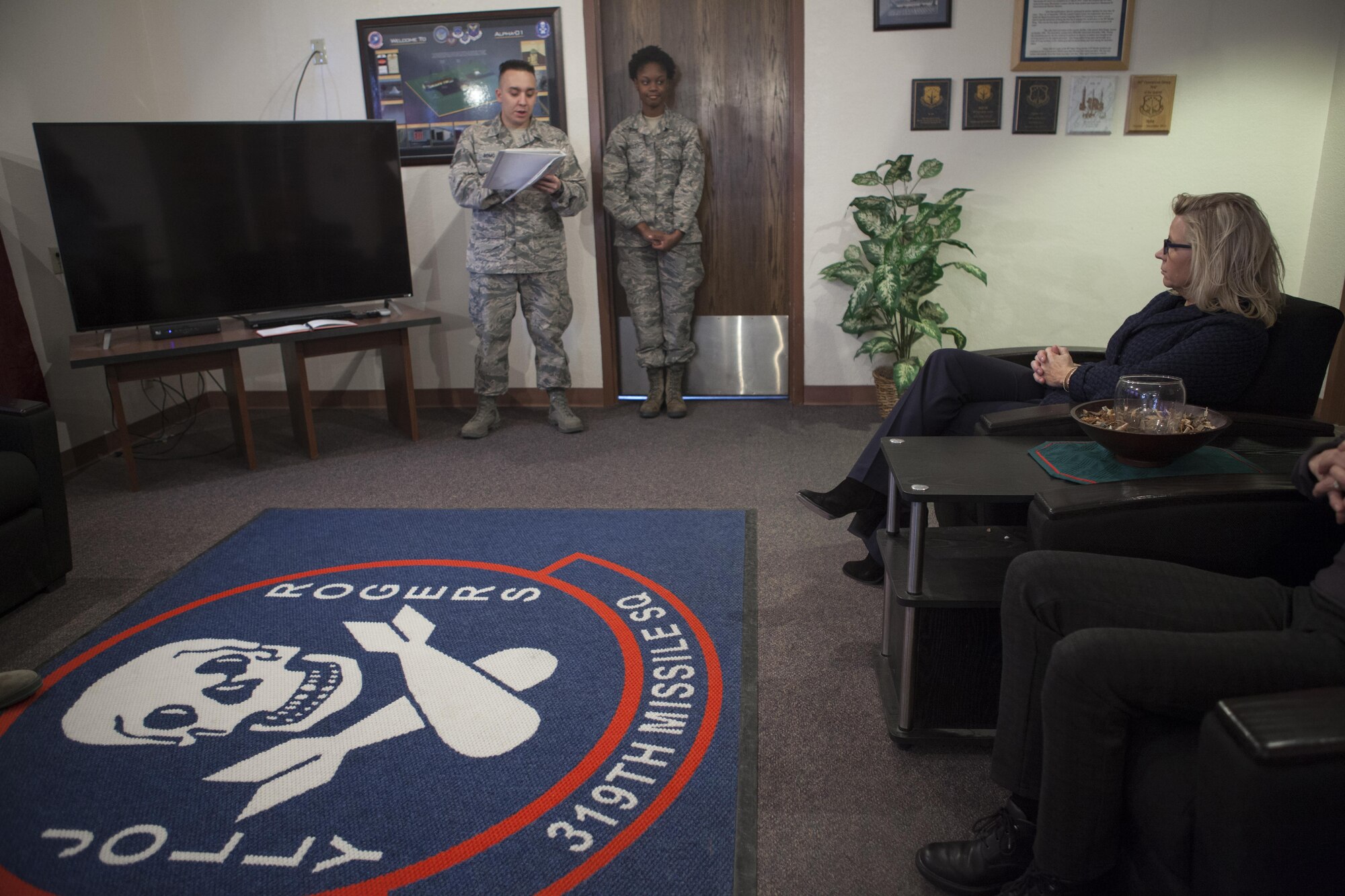 Staff Sgt. Dericke Romo, 319th Missile Squadron missile alert facility manager, gives a safety brief to U.S. Rep. Liz Cheney at a MAF on the F.E. Warren Air Force Base missile complex, Feb. 10, 2017. As a representative of Wyoming, Cheney wanted to familiarize herself with the 90th Missile Wing’s mission. (U.S. Air Force photo by Lan Kim)