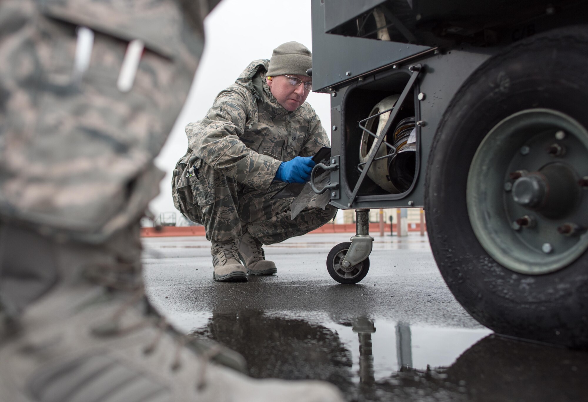 Staff Sgt. Steve Perron, 349th Aerospace Generation Equipment Flight mechanic, inspects an engine-driven generator Feb. 6, 2017, at Travis Air Force Base, Calif. Because generators can remain stationary and unused for significant periods of time, they must be periodically inspected to guard against low batteries, low tire pressure and fuel issues before they are delivered to aircraft mechanics on the flight line.
This week hundreds of Citizen Airmen assigned to the 349th Maintenance Group are participating in Wrench Week, accomplishing ancillary training, upgrade training, and gaining practical experience necessary to sharpen their primary job skills. (U.S. Air Force photo by Ken Wright)