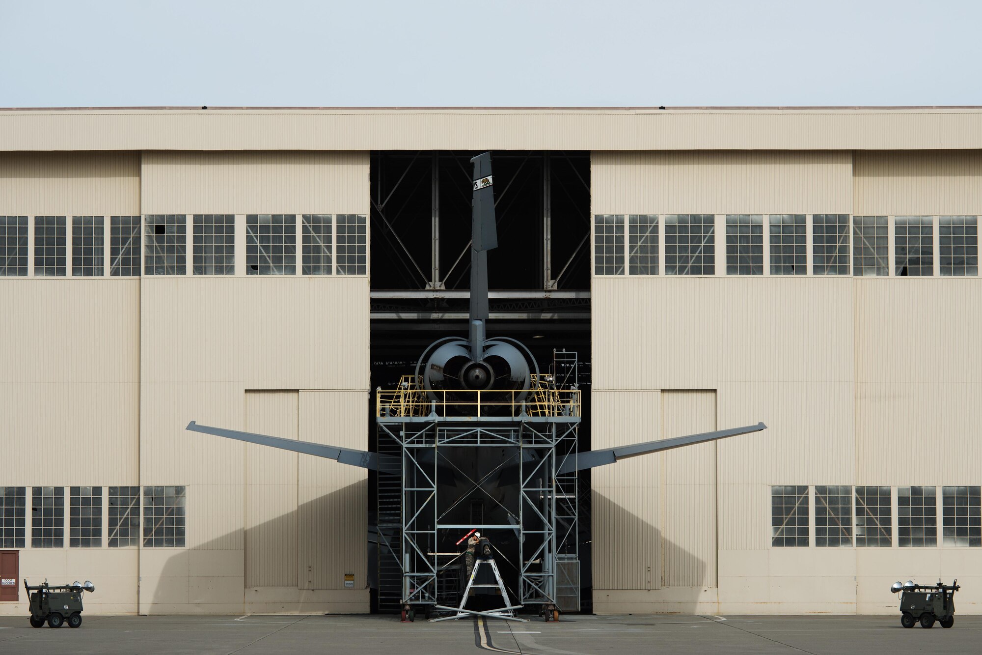 Airman 1st Class Andrew Dashler, 60th Maintenance Squadron KC-10 crew chief, works on the boom of an aircraft undergoing periodic checks and maintenance at Travis Air Force Base, Calif. During the week of Feb. 7, 2016, Airmen from the 60th Maintenance Group are working alongside hundreds of Citizen Airmen from the 349th Maintenance Group to take part in Wrench Week 2017. The event offers opportunities for reservists to accomplish ancillary training, upgrade training, and gain practical experience necessary to sharpen their primary job skills. (U.S. Air Force photo by Ken Wright)