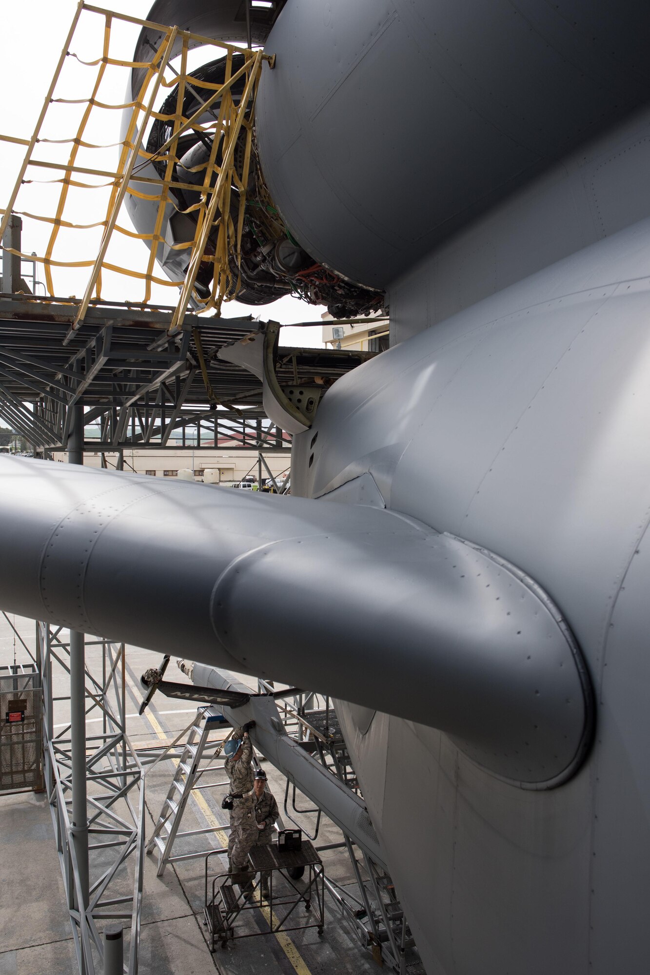 Air Force Staff Sgts. Charles Womack and Brandon Nicolas, 349th Maintenance Squadron crew chiefs, replace a panel on the boom of a KC-10 Extender at Travis Air Force Base, Calif., Feb. 7, 2016. This week, the reservists are working alongside hundreds of their fellow Citizen Airmen from the 349th Maintenance Group to support Wrench Week 2017. The event offers opportunities for reservists to accomplish ancillary training, upgrade training, and gain practical experience necessary to sharpen their primary job skills. (U.S. Air Force photo by Ken Wright)