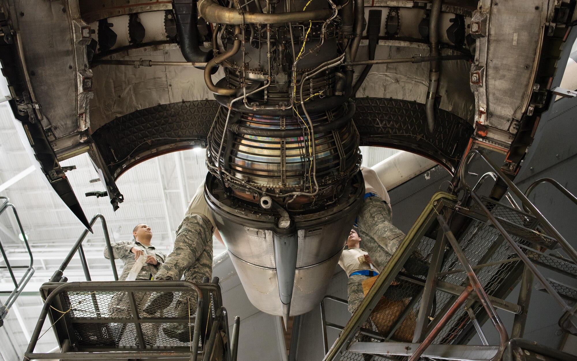 A crew of Citizen Airmen from the 945th Aircraft Maintenance Squadron at Travis Air Force Base, Calif., work together to replace C-17 Globemaster III engine panels, Feb. 10, 2017. The reservists were on duty to participate in Wrench Week 2017, which offers Citizen Airmen opportunities to reinforce and build their primary job skills. (U.S. Air Force photo by Ken Wright)