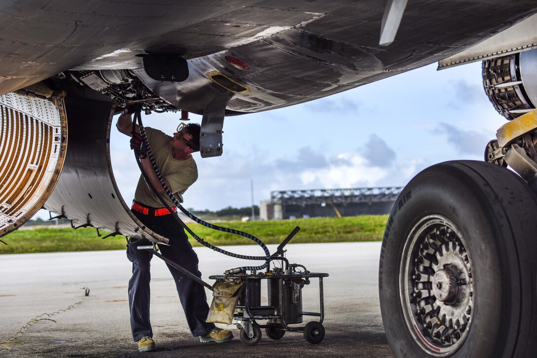 Air Force Senior Airman Cameron Hylan services an engine on a B-1B Lancer at Andersen Air Force Base, Guam, Feb. 6, 2017. Hylan is assigned to the 36th Expeditionary Aircraft Maintenance Squadron. Air Force photo by Tech. Sgt. Richard P. Ebensberger