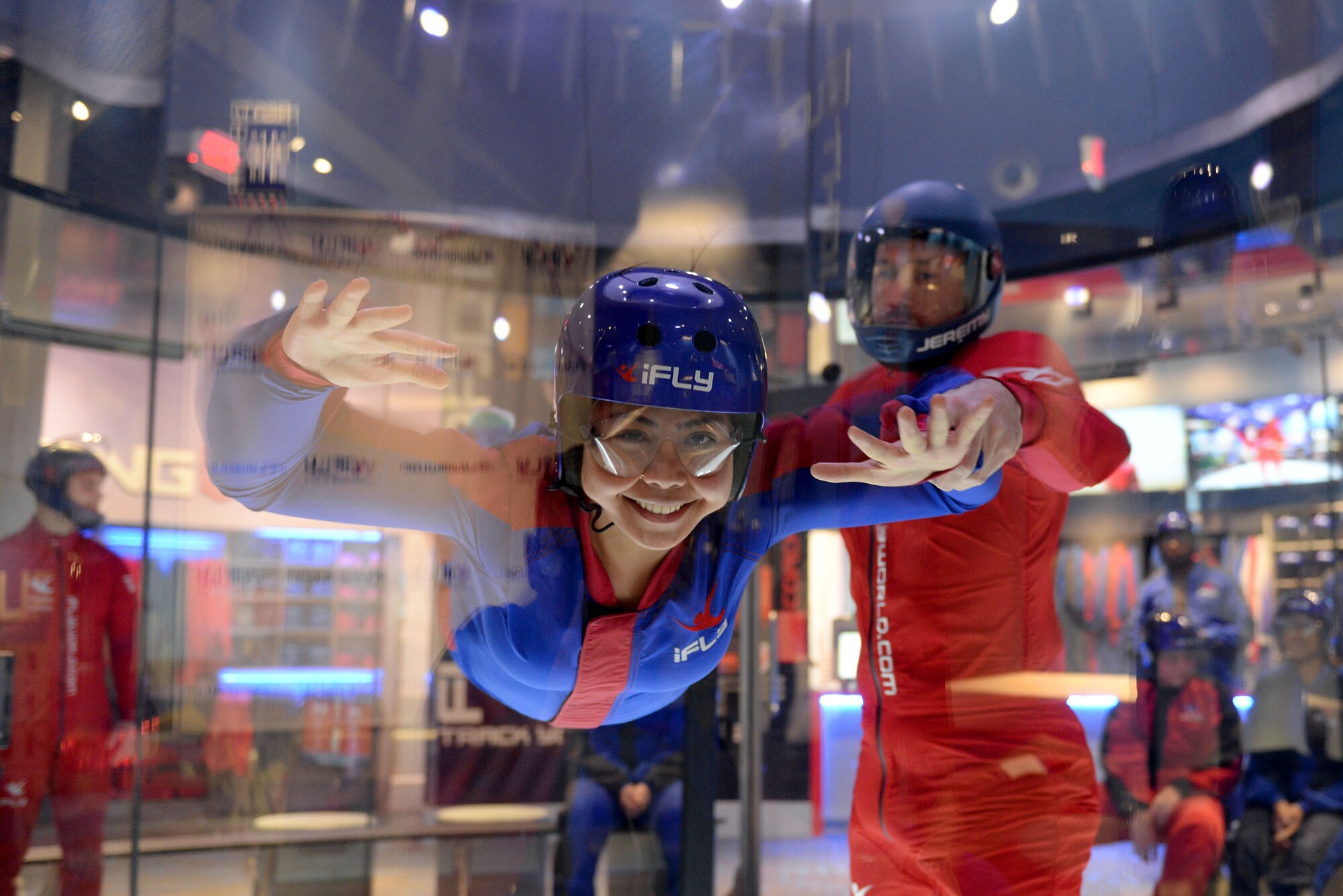 U.S. Air Force Airman Kristian Cadalin, 97th Force Support Squadron services apprentice, floats in the air at an indoor skydiving facility, Feb. 10, 2017, in Edmond, Oklahoma. The goal of the outreach event was to give the opportunity for single Airmen to reignite their spirituality while providing a fun community experience. (U.S. Air Force photo by Airman 1st Class Cody Dowell/released)