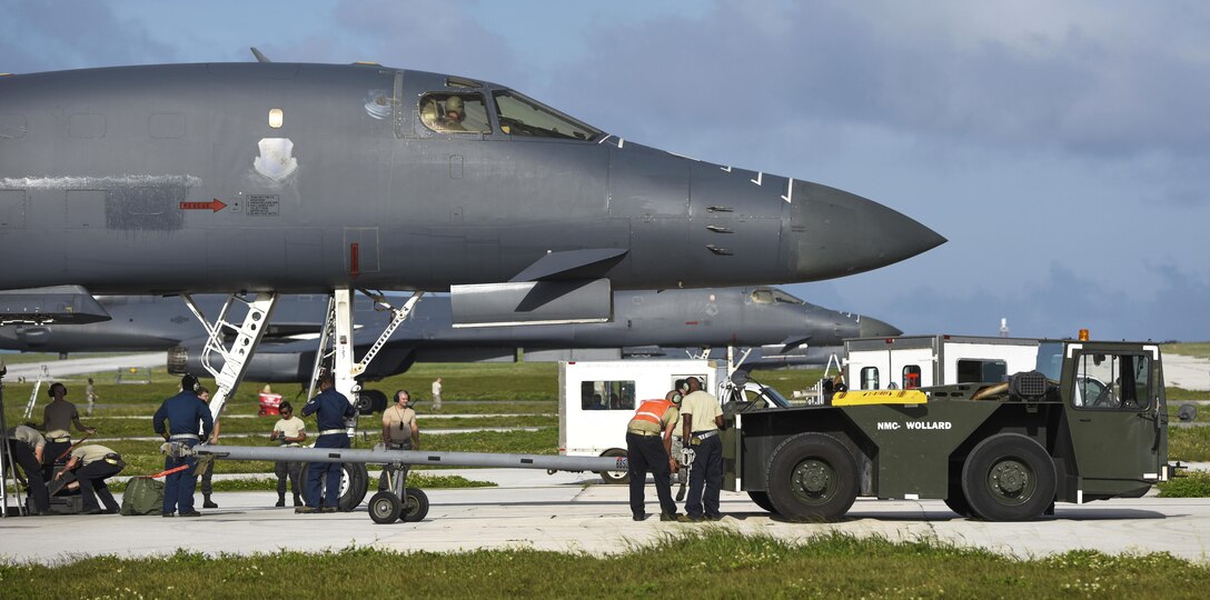 Airmen service an Air Force B-1B Lancer after arriving at Andersen Air Force Base, Guam, Feb. 6, 2017. Air Force photo by Tech. Sgt. Richard P. Ebensberger