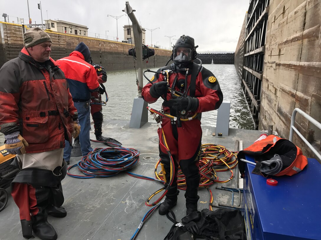 On a cold and snowy day in February, members of the district's dive team conducted operations to inspect and measure the lower sill of the 600-foot chamber at Montgomery Locks and Dam on the Ohio River. The measurements were requested by the Inland Navigation Design Center to assist them in the final design for the new bulkhead sill system. The new sill system is expected to be installed during fiscal year 2018. The team completed the mission in half the time and without incident.