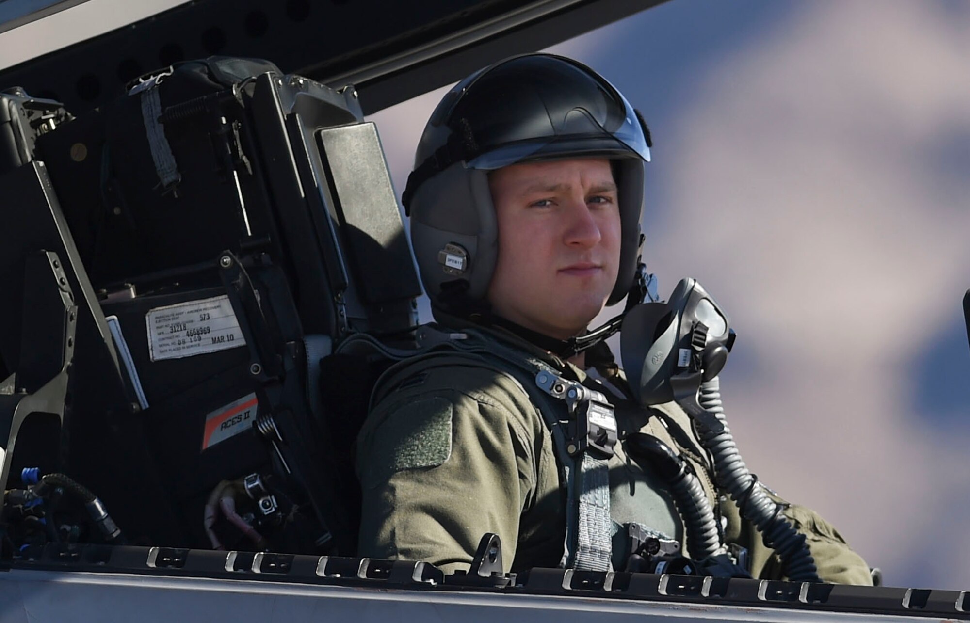 A 1st Fighter Wing F-22 Raptor pilot waits for his signal to taxi for takeoff during Red Flag 17-1 at Nellis Air Force Base, Nev., Jan 26, 2017. The 1st FW pilots are integrating with cyber and space fields to better support the fourth-and fifth-generation joint and coalition aircraft. (U.S Air Force photo by Staff Sgt. Natasha Stannard)