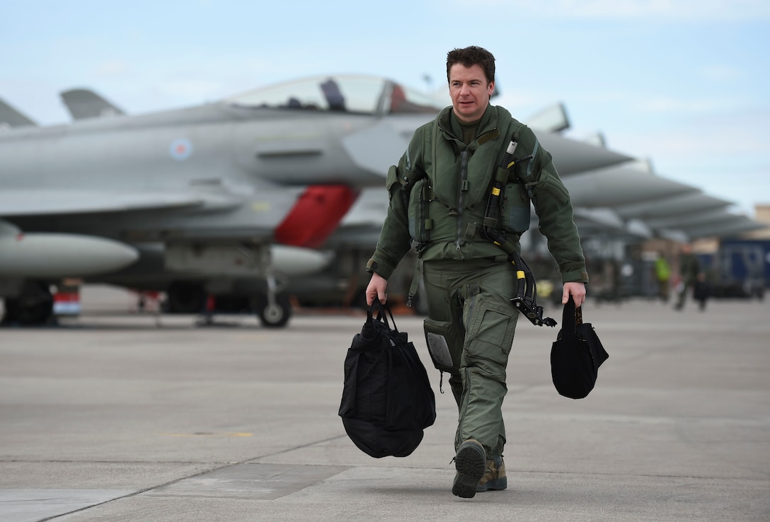 Royal Air Force Flight Lt. Jonny Mulhall, 6th Squadron Eurofighter Typhoon pilot, walks to his aircraft during Red Flag 17-1 at Nellis Air Force Base, Nev., Feb. 7, 2017. The Royal Air Force and Australian Air Force participated in 17-1 alongside their U.S. partners to enhance tactics, techniques and procedures in air, space and cyber domains. (U.S Air Force photo by Staff Sgt. Natasha Stannard)