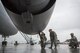 Tech. Sgt. Benjamin Perdido, Staff Sgt. Derrik Miller and Tech. Sgt. A.J. Hunt (kneeling), 749th Aircraft Maintenance Squadron crew chiefs, conduct an operations check on the engine of a KC-10 Extender Feb. 9, 2017 at Travis Air Force Base, Calif. The Citizen Airmen worked through wind and rain throughout the day, but for these committed maintainers, it's business as usual supporting America's Air Force. Wrench Week brings together hundreds of 349th Air Mobility Wing reservist maintainers to learn, work and grow together. While their efforts enhance their readiness and skill sets, it also contributes a great deal of support to their active duty counterparts at Travis. (U.S. Air Force photo by Ken Wright)