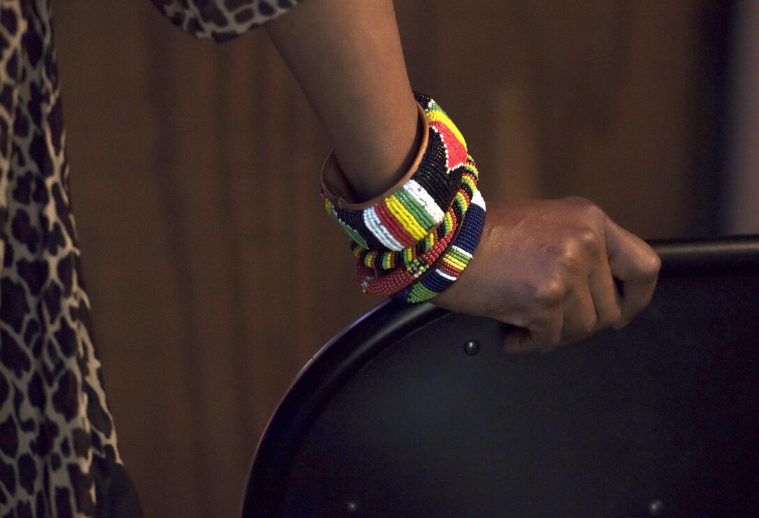 Nnenna Freelon, vocalist, holds the back of a chair while waiting backstage before singing alongside the U.S. Air Force Band Airmen of Note during a 2017 Jazz Concert Series performance at the Rachel M. Schlesinger Concert Hall and Arts Center in Alexandria, Va., Feb. 9, 2017. Freelon, a six-time Grammy nominee, has toured with many jazz artists, including Ellis Marsalis and Ray Charles. (U.S. Air Force photo by Airman 1st Class Gabrielle Spalding)