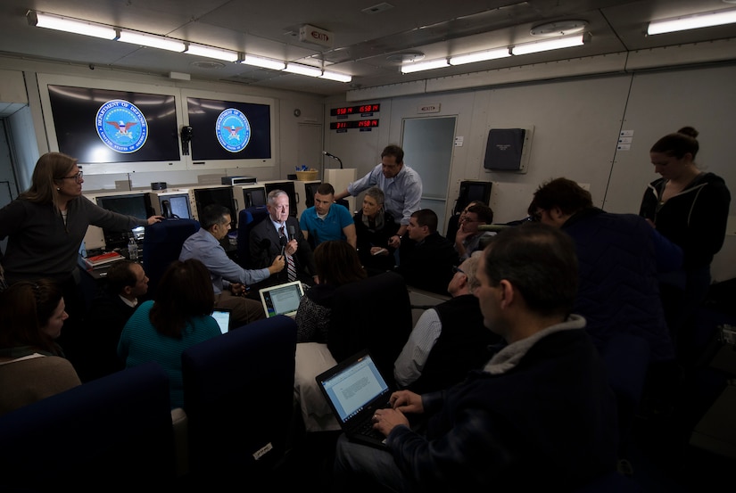 Defense Secretary Jim Mattis speaks with reporters aboard an E-4B National Airborne Operations Center aircraft over the Atlantic Ocean while en route to Brussels for a NATO defense ministers conference, Feb. 14, 2017. DoD photo by Air Force Tech. Sgt. Brigitte N. Brantley