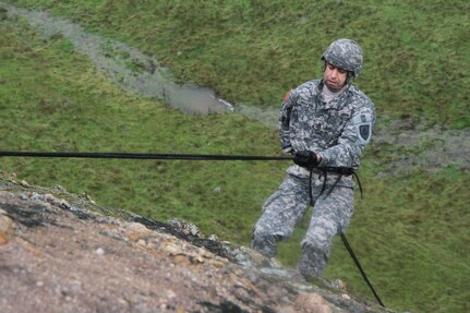 U.S. Army Staff Sgt. Mohammed Marhfour of the 3-290th, 91st Training Division rapels down a rock face as part of a confidence course on February 7th, 2017 on Ft. Hunter Liggett, Calif. Marhfour competed in the 91st Training Division's Best warrior competition that tested their endurance and knowledge of warrior tasks and drills. (U.S. Army photo by Spc. Derek Cummings/Released)