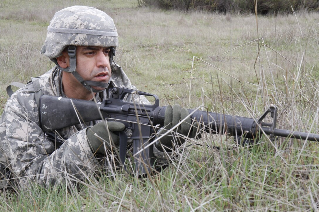 U.S. Army Staff Sgt. Mohammed Marhfour of the 3-290th, 91st Training Division pulls guard during a simulated extraction mission on February 8th, 2017 on Ft. Hunter Liggett, Calif. Soldiers competed in the 91st Training Division's Best Warrior Competition that tested their endurance and knowledge of warrior tasks and drills. (U.S. Army photo by Spc. Derek Cummings/Released)