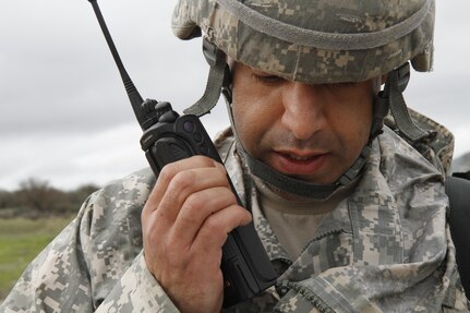 U.S. Army Staff Sgt. Mohammed Marhfour of the 3-290th, 91st Training Division calls up a 9-line medical evacuation during a simulated extraction mission on February 8th, 2017 on Ft. Hunter Liggett, Calif. Soldiers competed in the 91st Training Division's Best Warrior Competition that tested their endurance and knowledge of warrior tasks and drills. (U.S. Army photo by Spc. Derek Cummings/Released)