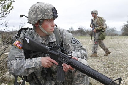 U.S. Army Spc. Jordan Howes of the 2- 378th, 91st Training Division pulls guard for members of team during a simulated extraction mission on February 8th, 2017 on Ft. Hunter Liggett, Calif. Soldiers competed in the 91st Training Division's Best Warrior Competition that tested their endurance and knowledge of warrior tasks and drills. (U.S. Army photo by Spc. Derek Cummings/Released)