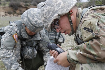 U.S. Army Pfc. Juan Millan of the 75th Training Division calls up a 9-line medical evacuation during a simulated extraction mission on February 8th, 2017 on Ft. Hunter Liggett, Calif. Soldiers competed in the 91st Training Division's Best Warrior Competition that tested their endurance and knowledge of warrior tasks and drills. (U.S. Army photo by Spc. Derek Cummings/Released)