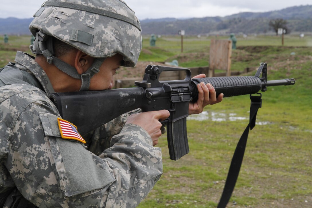 U.S. Army Sgt. Kinoroy Quilaton of the 91st Training Division fires at targets during a reactive fire lane on February 8th, 2017 on Ft. Hunter Liggett, Calif. Soldiers competed in the 91st Training Division's Best Warrior Competition that tested their endurance and knowledge of warrior tasks and drills. (U.S. Army photo by Spc. Derek Cummings/Released)