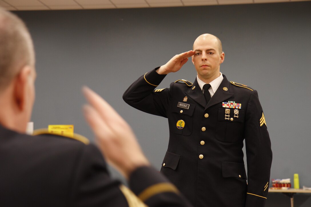 U.S. Army Sgt. Robert Beedle of the 11-104th, 91st Training Division reports to the president of the board on February 9th, 2017 on Ft. Hunter Liggett, Calif. Soldiers from multiple divisions competed in the 91st Training Division's Best warrior competition that tested their endurance and knowledge of warrior tasks and drills. (U.S. Army photo by Spc. Derek Cummings/Released)