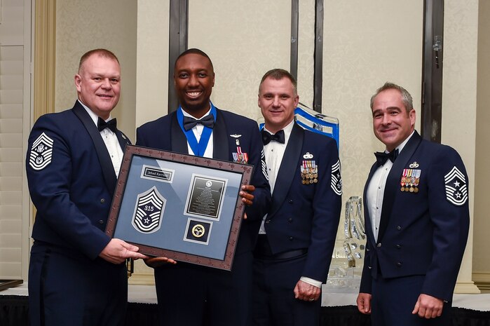 From left to right: retired Chief Master Sgt. James Roy, 16th Chief Master Sergeant of the Air Force, recognizes Chief Master Sgt. Jehad Karriem, 315th Aerospace Medical Squadron superintendent, along with Chief Master Sgt. Mark Barber, 315th Airlift Wing command chief, and Chief Master Sgt. Kristopher K. Berg, 437th Airlift Wing command chief, during the chief master sergeant recognition ceremony at the Charleston Club Feb. 11, 2017. Chief master sergeant is the highest enlisted rank in the Air Force held by one percent of the enlisted force.