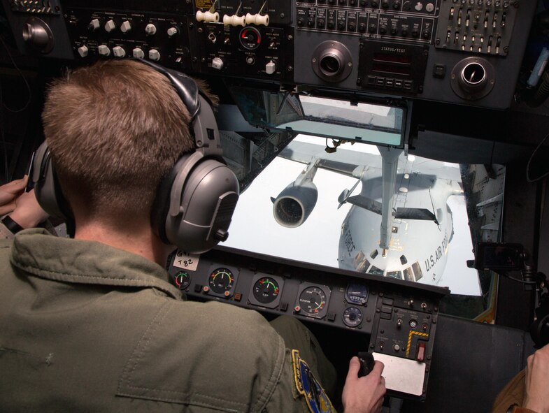 Staff Sgt. Jeremy Rigg, a KC-10A Extender air refueling boom operator, 70th Air Refueling Squadron, practices refueling a C-17 Globemaster III over the Pacific Ocean Feb. 14, 2017.  The drill-weekend training was part of the 349th Air Mobility Wing’s Patriot Wyvern exercise, which emphasized hands-on job skills training. (U.S. Air Force photo by Lt. Col. Robert Couse-Baker)