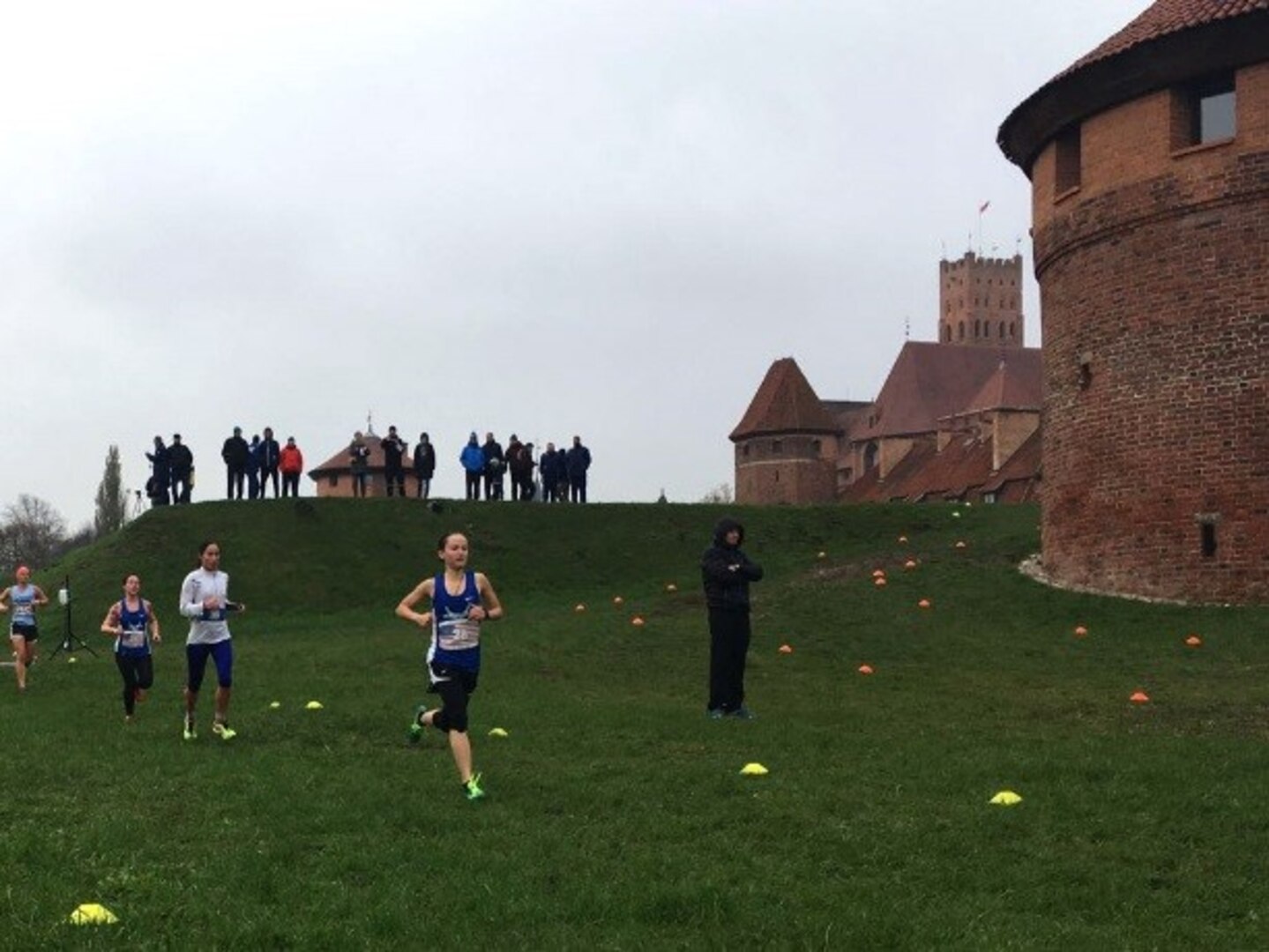 Senior Airman Lacey Kap, 460th Operations Support Squadron space systems operator on Buckley Air Force Base, Colo., participates in a 6k run at the 2016 NATO Headquarters Allied Air Command Inter-Nation Cross-Country Championship Oct. 27th, in Malbork, Poland. The Inter-Nation Sports program brings together the contributing allied nations in an atmosphere of friendly sporting competition. (Courtesy photo)