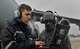 Senior Airman Earl Shelton, 721st Aircraft Maintenance Squadron aerospace maintenance technician, marshals a C-5M Super Galaxy into place at Ramstein Air Base, Germany, Jan. 24, 2017. After it was in place, 721st AMXS Airmen chocked the wheels, plugged it into a generator, checked tire pressure, refilled oil, and refueled the aircraft. On average, the 721st AMXS inspects, services, and repairs 30 aircraft in a single day, as part of the 521st Air Mobility Operations Wing at Ramstein.  (U.S. Air Force photo by Senior Airman Tryphena Mayhugh)