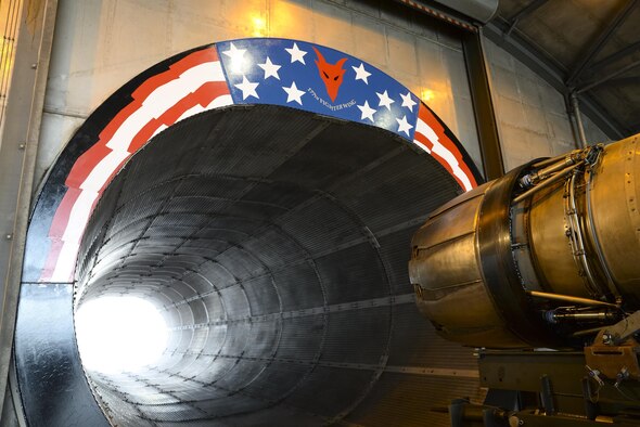 An image of a morale painting designed, funded and created by members of a New Jersey Air National Guard propulsion element at the "hush house, located at the 177th Fighter Wing, Atlantic City Air National Guard Base, N.J., on Jan. 31, 2017. The engine shop personnel wanted to create a feeling of Esprit de Corps and a reminder of just how amazing it is to work on such a complex and important military machine. The General Electric F110-GE-100 turbofan, prepped and ready for testing, produces close to 29,000 pounds of static thrust in afterburner, which can propel the Fighting Falcon to approximately twice the speed of sound. (U.S. Air National Guard photo by Master Sgt. Andrew J. Moseley/Released)