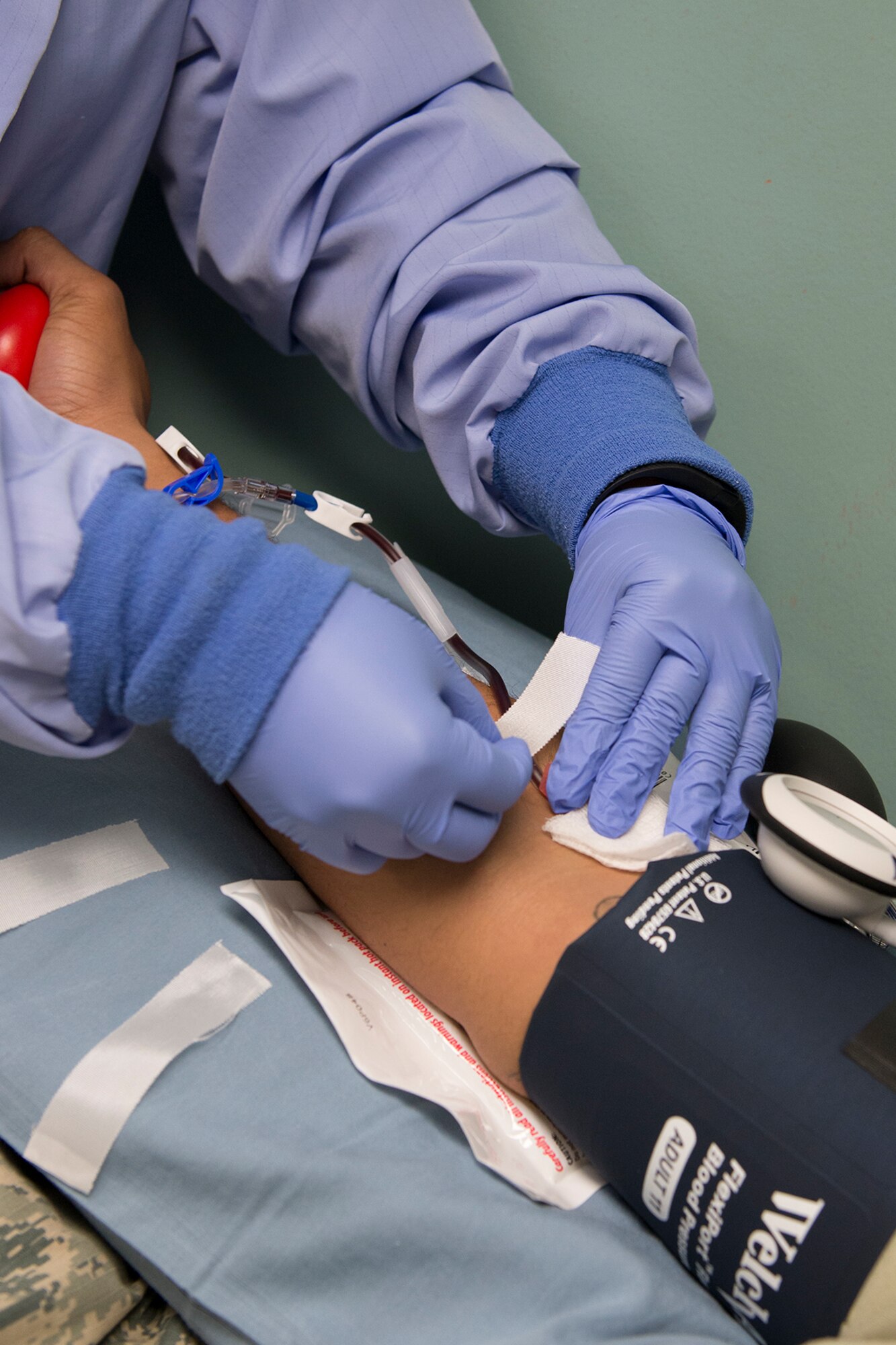 A medical lab technician draws blood from a volunteer for  Feb. 14 at Armed Services Blood Bank Center-San Antonio facility at Joint Base San Antonio-Lackland, Texas. The facility supports service members in Afghanistan, Iraq, San Antonio Military Medical Facility and the local Veterans Affairs hospital. The platelets are for patients with cancer, burns and bleeding problems. 