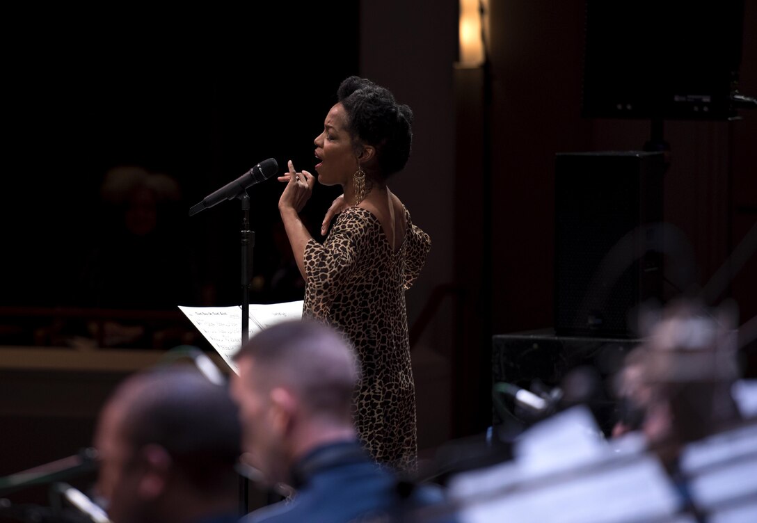 Nnenna Freelon, vocalist, sings alongside the U.S. Air Force Band Airmen of Note at the Rachel M. Schlesinger Concert Hall and Arts Center in Alexandria, Va., Feb. 9, 2017. This performance was part of the Jazz Heritage Concert Series, which will take place throughout the year and feature various notable jazz musicians. (U.S. Air Force photo by Airman 1st Class Gabrielle Spalding)