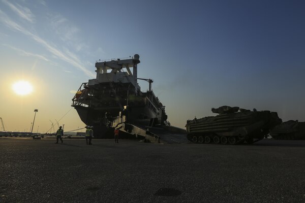 U.S. Marines with Combat Logistics Battalion 4 offload an Assault Amphibious Vehicle from the USNS Gunnery Sgt. Fred W. Stockham, during exercise Cobra Gold, at Laem Chabang International Terminal, Thailand, Feb. 11, 2017. Cobra Gold, in its 36th iteration, is an important element of the United States' and all other participating nations' regional military to military engagement efforts. (U.S. Marine Corps photo by Cpl. Wesley Timm)