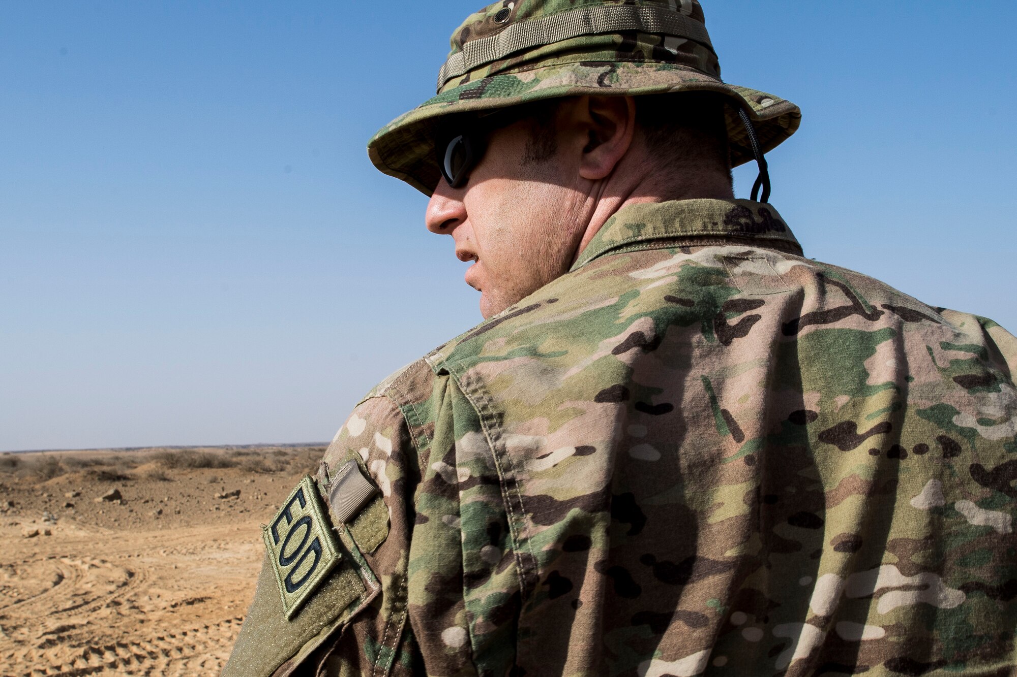 Master Sgt. Neil Gertiser, 332nd Expeditionary Civil Engineer Squadron explosive ordnance disposal technician, supervises a detonation as the range safety officer, Feb. 11, 2017, in Southwest Asia. These essential technicians respond to in flight emergencies and properly dispose of hazardous or unserviceable explosives and ammunition. (U.S. Air Force photo by Staff Sgt. Eboni Reams)