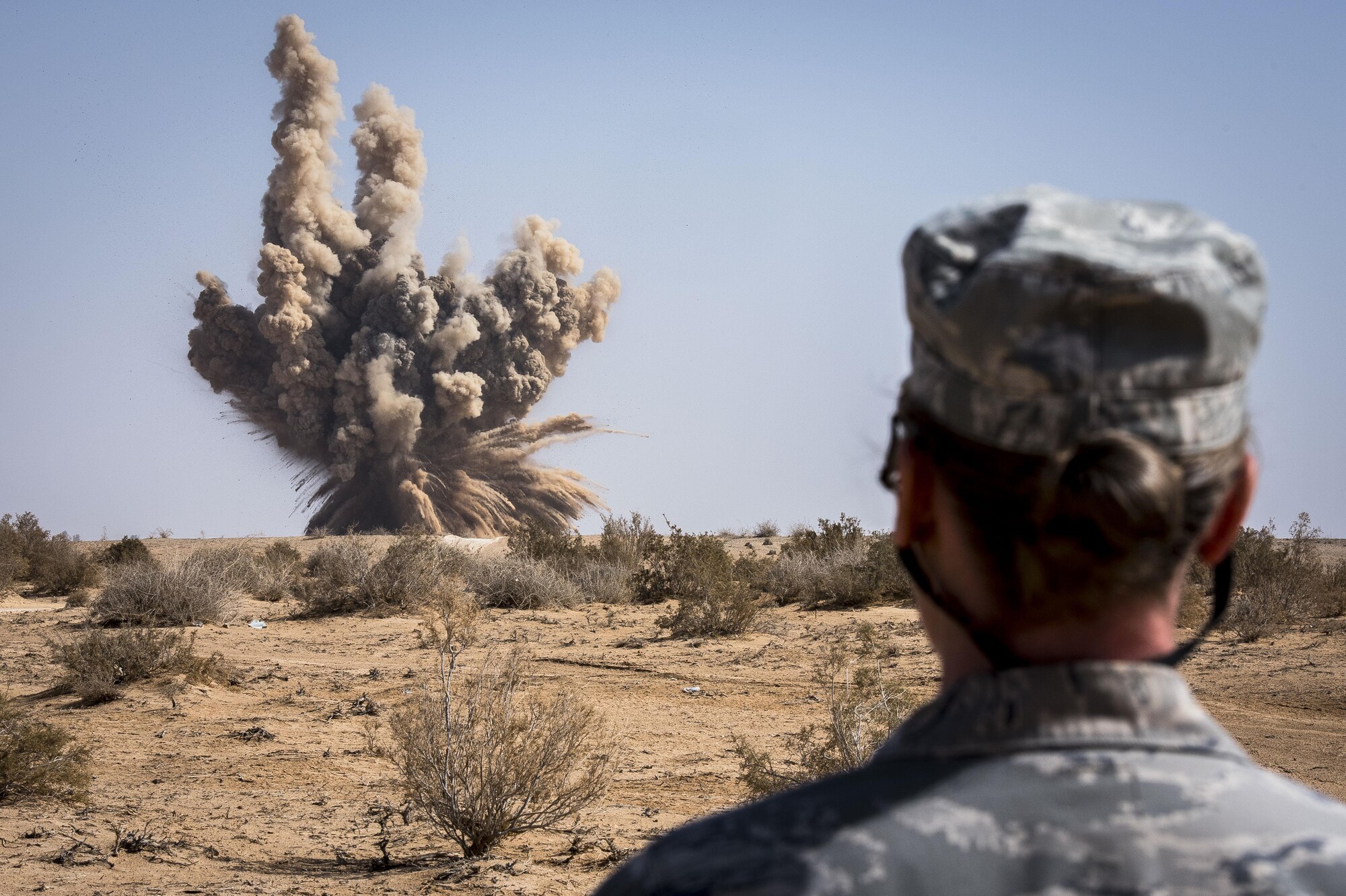 Master Sgt. Victoria Kenny, 332nd Expeditionary Civil Engineer Squadron first sergeant, detonates explosives on a range, Feb. 11, 2017, in Southwest Asia. The 332nd ECES Explosive Ordnance Disposal Flight facilitated a detonation with the help of U.S. Marine Corps EOD technicians and coalition partners. (U.S. Air Force photo by Staff Sgt. Eboni Reams)