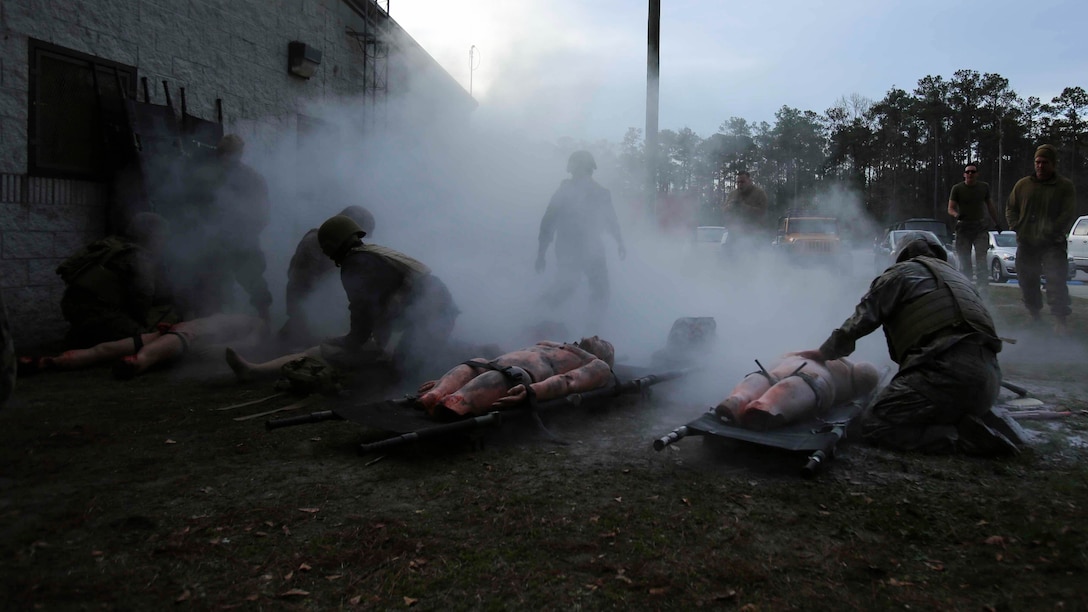 Corpsmen rehearse giving life-saving medical attention to notional wounds during a Tactical Combat Casualty Care training exercise at Marine Corps Base Camp Lejeune, North Carolina, Feb. 6-10, 2017. The TCCC is one of many tools used to keep corpsmen up to date and effective in their job field in order to best prepare for possible deployments. The corpsmen are with 2nd Medical Battalion. 