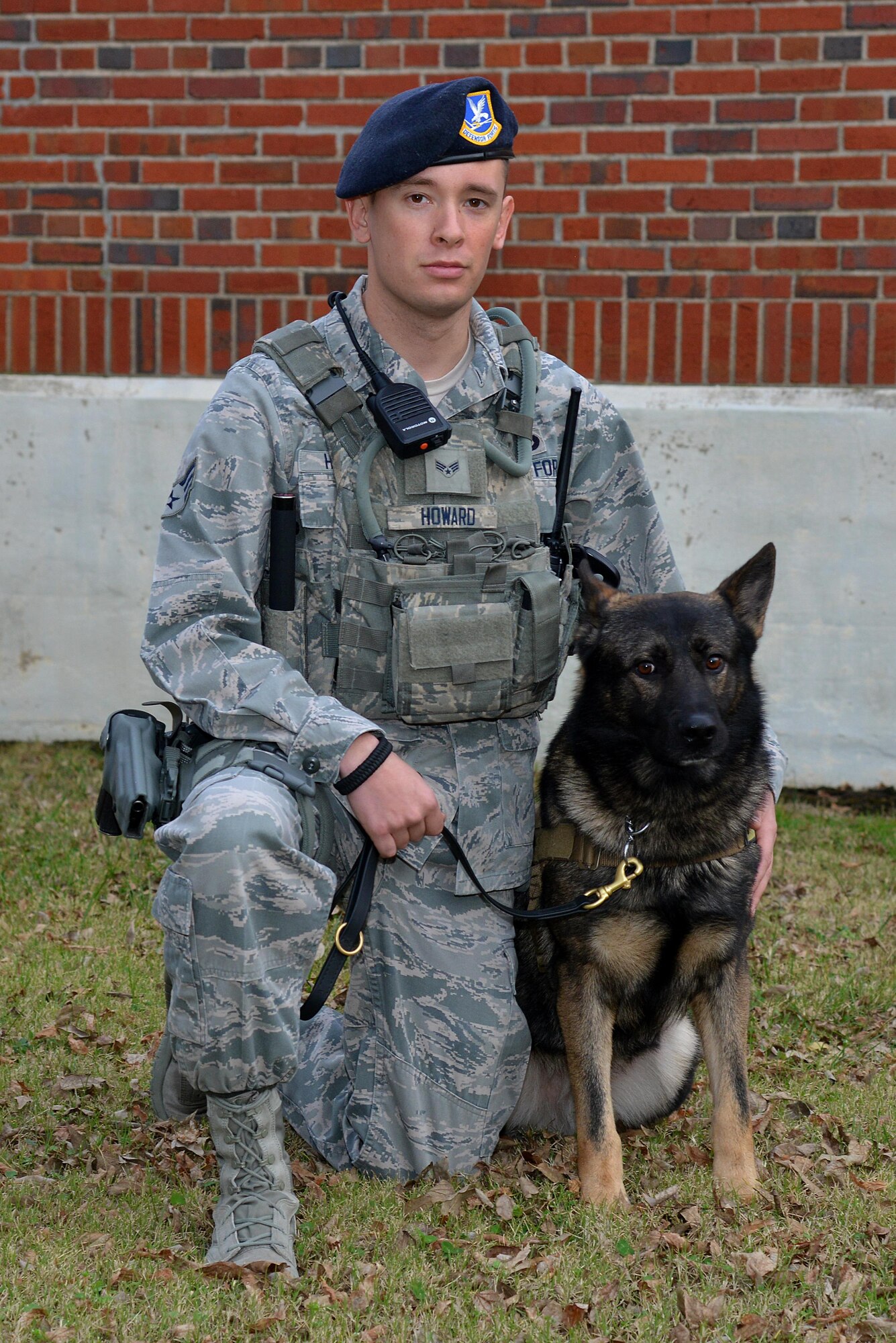U.S. Air Force Senior Airman Benjamin Howard, 633rd Security Forces Squadron military working dog handler, works as MWD team with Rony, a 633rd SFS MWD at Joint Base Langley-Eustis, Va., Dec. 14, 2016. MWD teams provide a unique ability to the 633rd SFS, depending on the team’s training, to detect explosives, narcotics, or people. (U.S. Air Force photo by Airman 1st Class Tristan Biese)