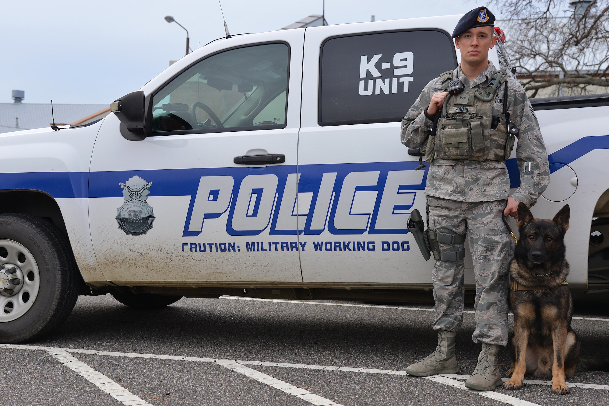U.S. Air Force Senior Airman Benjamin Howard, 633rd Security Forces Squadron military working dog handler, works as the handler for Rony, a 633rd SFS MWD at Joint Base Langley-Eustis, Va., Dec. 14, 2016. For 9 months, Howard and Rony have been a working as a MWD team, conducting patrols and detecting explosives. (U.S. Air Force photo by Airman 1st Class Tristan Biese)