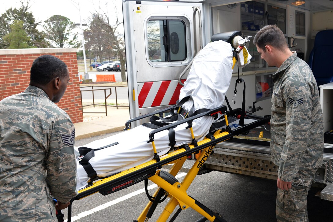 U.S. Air Force Staff Sgt. Terrance Thomas, 633rd Medical Group emergency technician, and Senior Airman Cody Blevins, 633rd MG paramedic, preforms an ambulance equipment check at Joint Base Langley-Eustis, Va., Jan 13, 2017. Ambulance services respond to all 911 calls on base to help patients while on-scene and transport them to the hospital if needed. (U.S. Air Force photo by Airman 1st Class Tristan Biese)