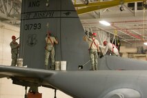 U.S. Airmen from the 139th Maintenance Squadron, Missouri Air National Guard, prepare to remove the vertical stabilizer from a C-130 Hercules aircraft at Rosecrans Air National Guard Base, St. Joseph, Mo., Feb. 7, 2017. The stabilizer was removed in order to fix a crack on a support structure on which the stabilizer sits. (U.S. Air National Guard photo by Master Sgt. Michael Crane)