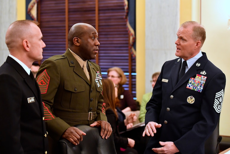 Chief Master Sgt. of the Air Force James A. Cody speaks with Master Chief Petty Officer of the Navy Steven Giordano and Sgt. Maj. of the Marine Corps Ronald L. Green before testifying at the Senate Armed Services Subcommittee on Personnel in Washington, D.C., Feb. 14, 2017. In his comments, Cody talked about compensation and growing the force.  This is the last Congressional hearing for Cody before he retires from the Air Force.  (U.S. Air Force photo/Scott M. Ash)