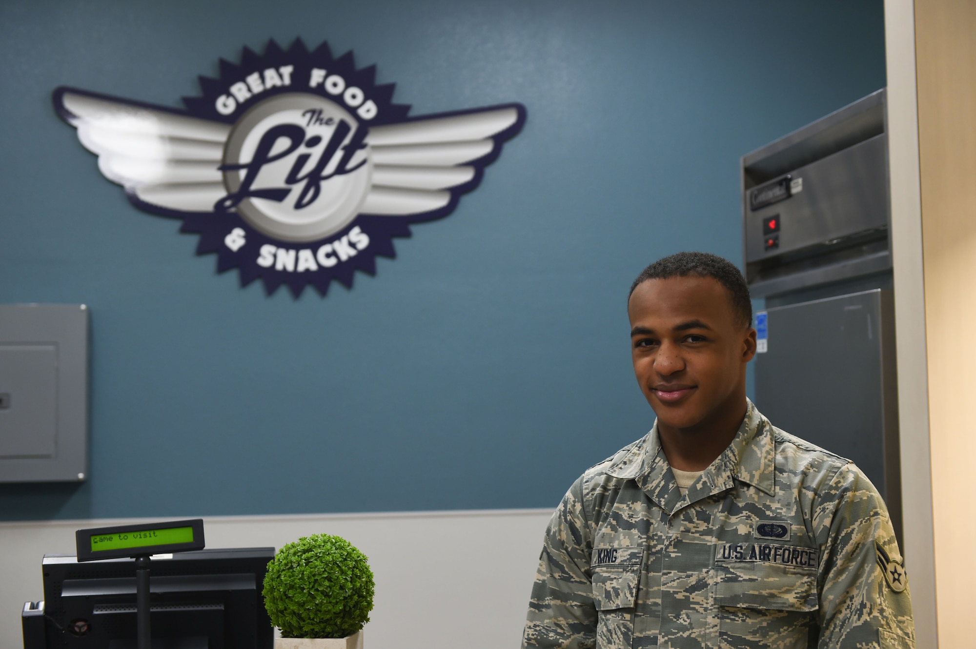 U.S. Air Force Airman 1st Class Malik King, 7th Force Support Squadron food service apprentice, stands in The Lift at Dyess Air Force Base, Texas, Feb. 8, 2017. The Lift is a flight kitchen located just inside a hangar off the Dyess flightline. Its purpose is to provide maintainers and aircrew, who may not have time to go to the Longhorn Dining Facility, with access to hot meals and snacks. (U.S. Air Force photo by Airman 1st Class Quay Drawdy)