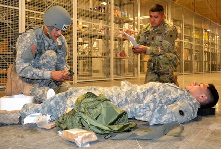 Spc. Kenny Ochoa, 481st Transportation Company, Port Hueneme, Calif., conducts Combat Lifesaver Course techniques during his competition at a Best Warrior Competition at the George W. Dunaway Army Reserve Center in Sloan, Nev. February 7-9. The Best Warrior Competition is an annual competition overseen by the Department of the Army as a means of identifying and recognizing Soldiers in active, special operations, National Guard and Reserve components of the United States Army.